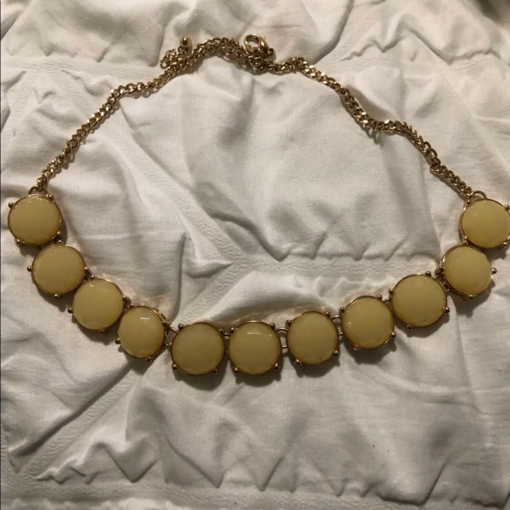 Statement necklace with gold and cream details